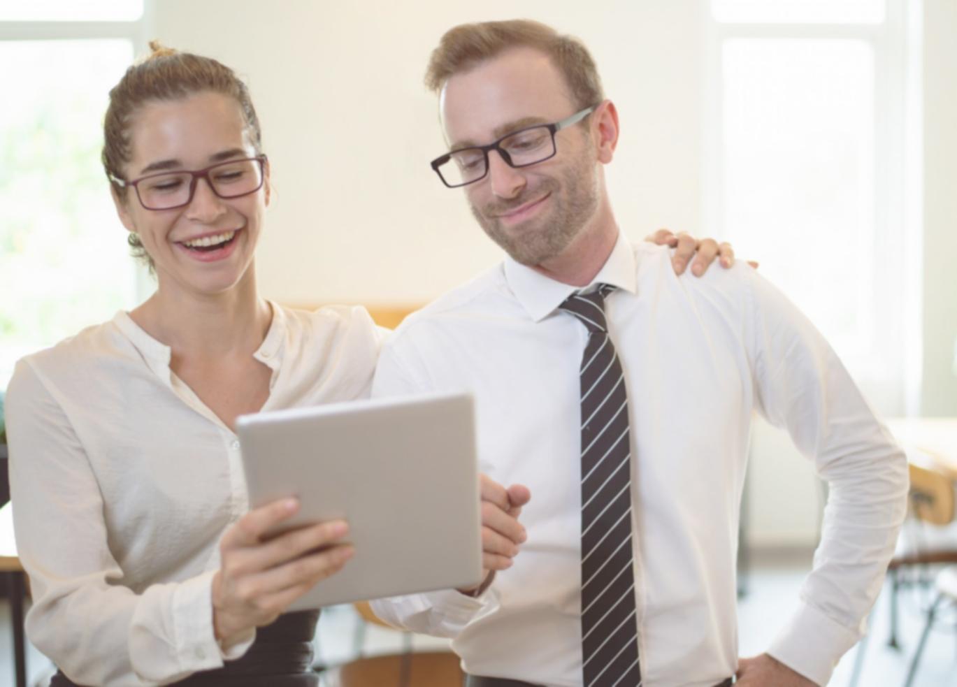 Person reviewing monthly budget planning documents